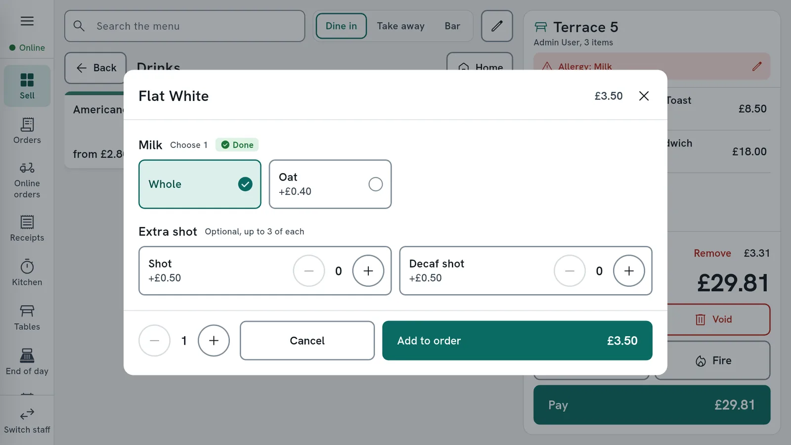 A table's bill on the till: two dishes, service charge and a Pay button